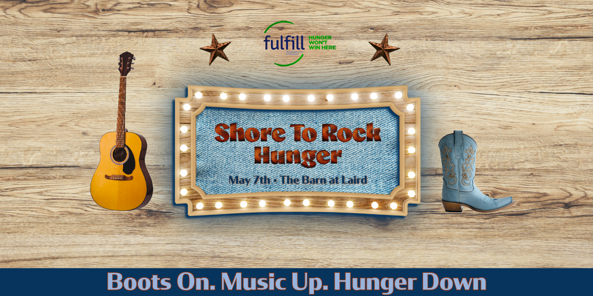 Image of wood background with guitar and boot that says 